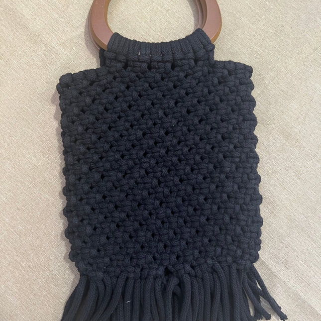 Cartera de mano con flecos color negra