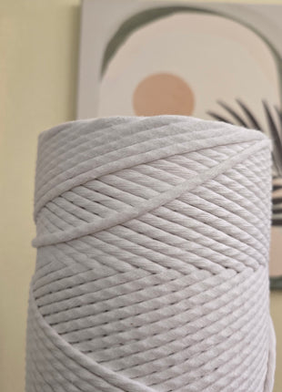 Rollos de hilo peinado o "single strand"