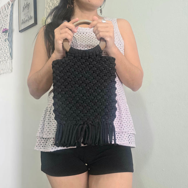 Black fringed handbag
